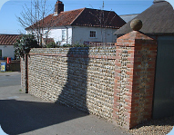 Traditional flint wall in lime mortar by Buff Construction